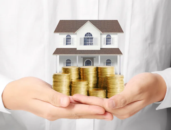 Mortgage concept by money house from coins — Stock Photo, Image