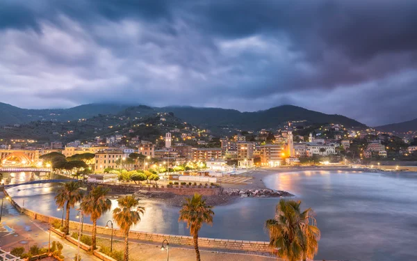 Town & beach of Ventimiglia in northern Italy at night — Stock Photo, Image