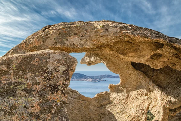 Calvi in Corsica viewed through hole in rock — Stock Photo, Image