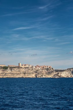 Bonifacio in Corsica perched on white cliffs above the Mediterra clipart