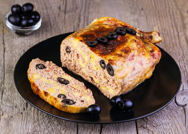 Chicken stuffed with cheese and olives — Stock Photo, Image