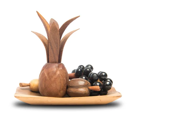 Nep houten vruchten op plaat — Stockfoto