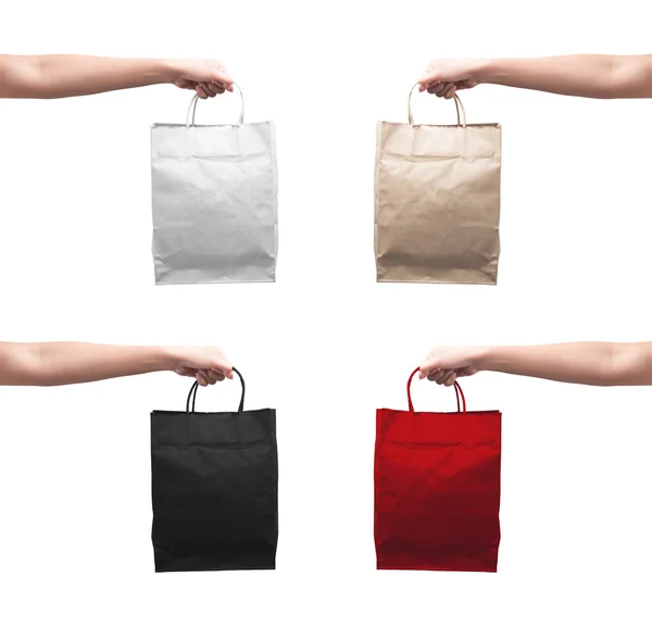 Female hand holding shopping bag — Stock Photo, Image