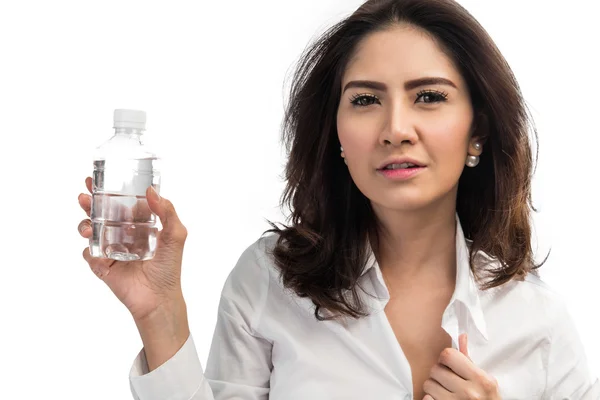 Business woman holding plastic bottle of water — Stock Photo, Image