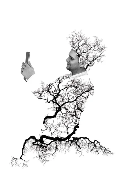 Doppia esposizione ritratto di uomo d'affari utilizzando tablet digitale con albero e ramo isolato su bianco — Foto Stock