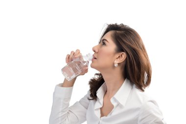 Beautiful business woman drinking water from bottle clipart