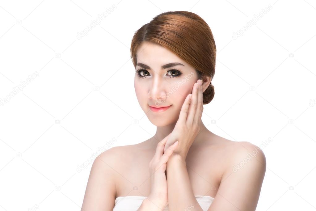 Beautiful woman cares for the skin face