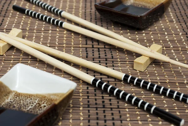 Sticks and bowls — Stock Photo, Image