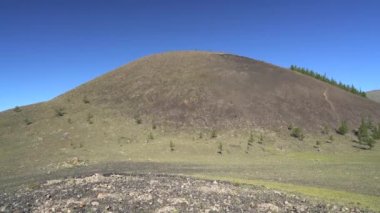 Düz Düzlük, Katı Lava Kayalarıyla kaplıdır. Katılaştırılmış Lava Kaya Dome Tepesi. Katılaşan Lav Kaya. Anlamsız düzenleme jeolojik düzenler, jeolojik tepecikler akrepler. Magmatik düz düzlük plato kül koni tepesi Caldera piroklastik doğa doğal volkan magması.