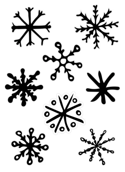 黒と白の落書きスケッチ雪の結晶ステッカーパック. — ストック写真