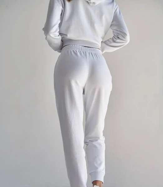 Fit Girl Wears White Pants Indoor Studio Clothing Photo — Stock Photo, Image