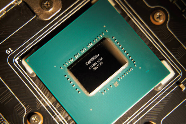 Nvidia GPU chip close up. Graphic card of computer circuit board macro photo. Cryptocurrency mining boom using videocard