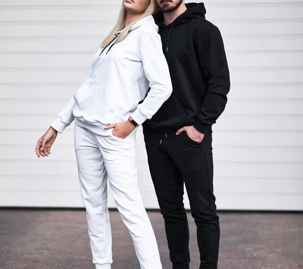 Woman Wears White Hoodie Man Wears Black Hoodie Clothing Mockup — Stock Photo, Image