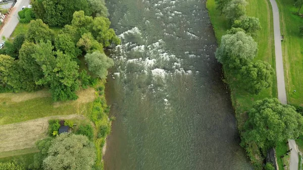 Hiking trail near forest and winding river