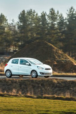 Modern econobox design parked near roadside