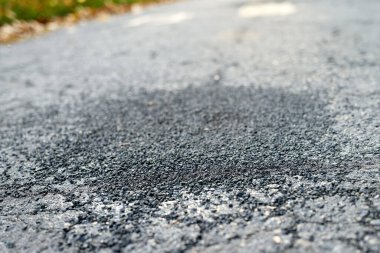 Modern yol makinesi sprey enjeksiyon yaması uyguluyor