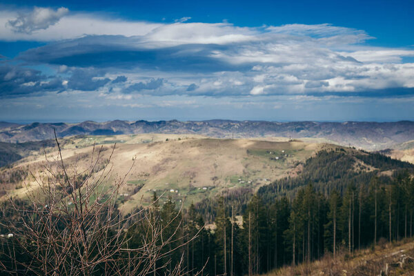 A canyon with a mountain in the background