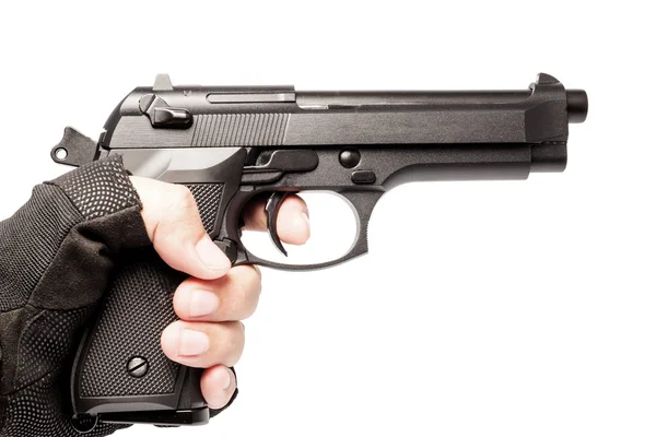 El tutuşu silahı beyaza izole edilmiş.