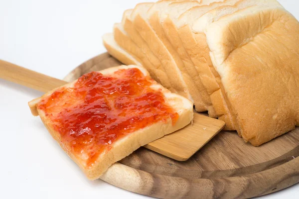 Sliced bread with jam isolate on white background — Stock Photo, Image