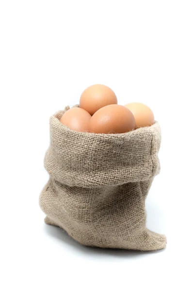Крупный план куриных яиц во вретище Стоковое Фото