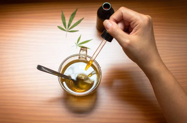 Top View Person Pouring Cbd Tincture Made Marijuana Hot Drink — Stock Photo, Image