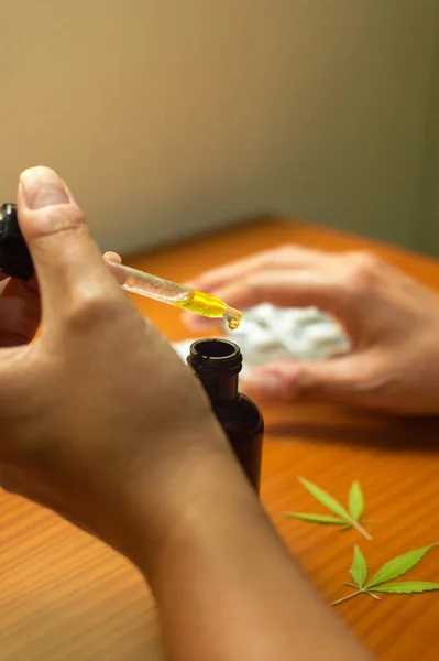 Person Using Cbd Oil Natural Remedy Made Cannabis Table Marijuana — Stock Photo, Image