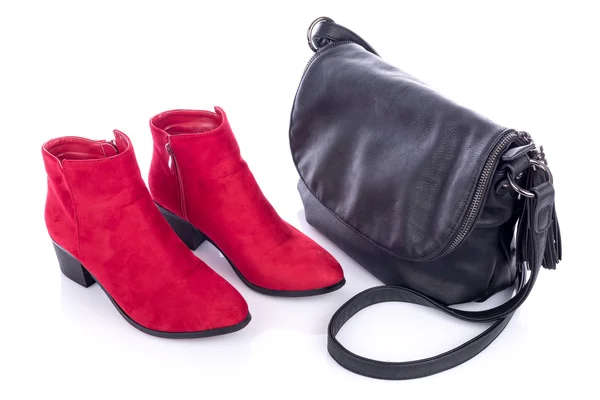 Red bootties and black handbag — Stock Photo, Image