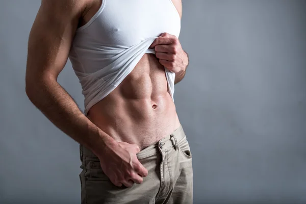 Abdominales del hombre atlético — Foto de Stock