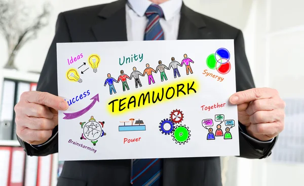 Teamwork concept shown by a businessman — Stock Photo, Image