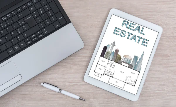 Real estate concept on a digital tablet — Stock Photo, Image