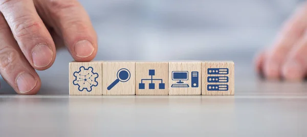 Concept of network management with icons on wooden cubes