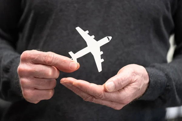 Человек Держит Бумажный Самолет Концепция Страхования Полета — стоковое фото