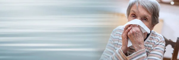 Elderly Woman Blowing Her Nose Panoramic Banner — Stock Photo, Image