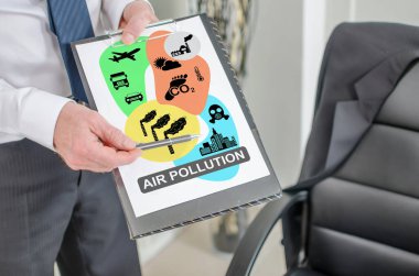 Panoda hava kirliliği kavramı gösteren bir iş adamı