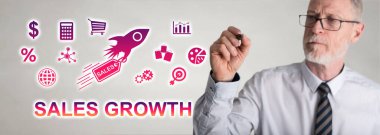 Bir işadamı tarafından çizilmiş satış büyüme konsepti