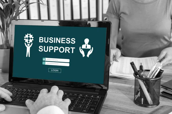 Laptop screen with business support concept