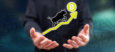 Bitcoin kabadayılığı eğilimi arka plandaki adamın ellerinden üstündür.