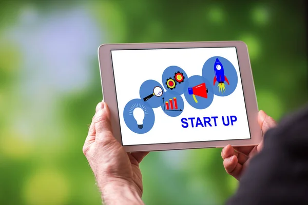 Man Holding Tablet Showing Start Concept — Stock Photo, Image