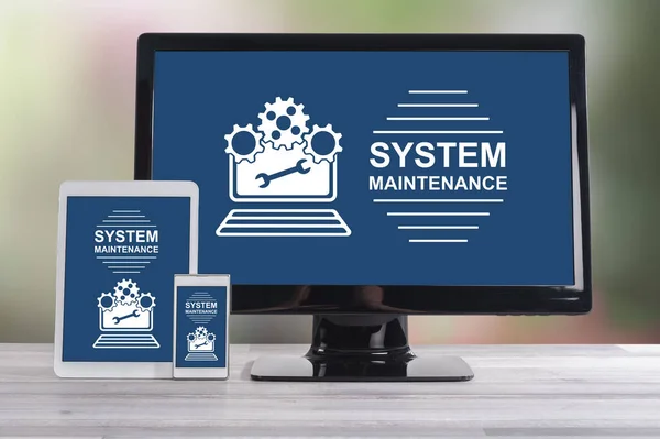 System maintenance concept shown on different information technology devices