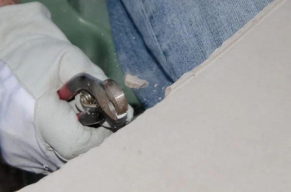 Use of a tile nipper to cut a tile — Stock Photo, Image