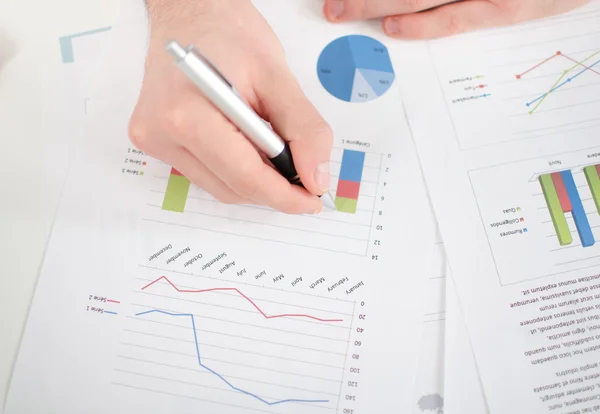 Analysis of business graphs — Stock Photo, Image
