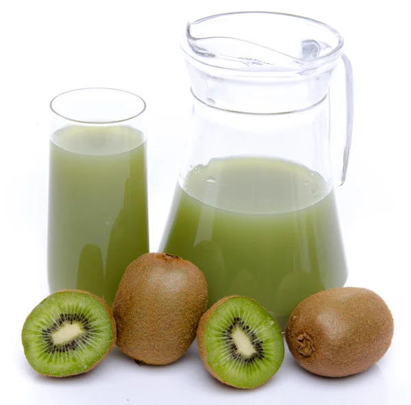 Jug and glass of kiwi juice and some fresh kiwis — Stock Photo, Image