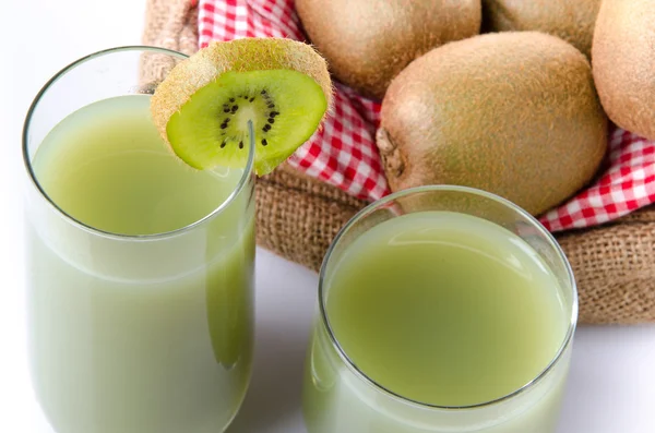 Composition with glasses of kiwi juice and fresh kiwis — Stock Photo, Image