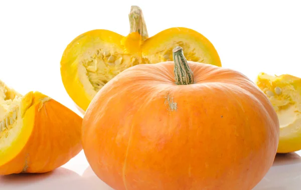 Nice big pumpkins cut into quarters — Stock Photo, Image