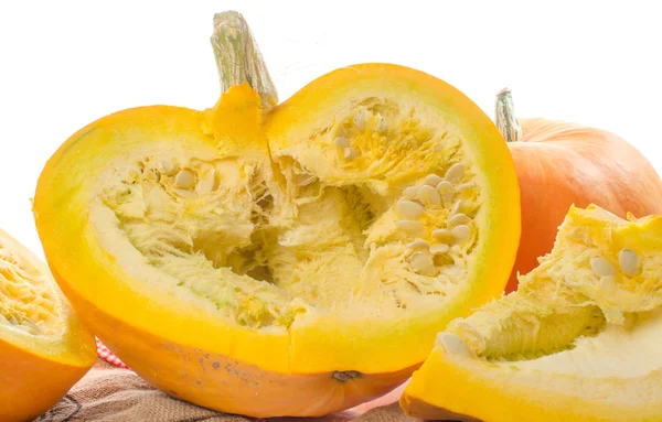 Nice big pumpkins cut into quarters — Stock Photo, Image