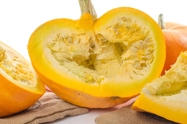 Nice big pumpkins cut into quarters — Stock Photo, Image