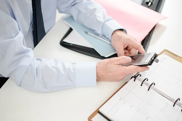 Businessman taking an appointment — Stock Photo, Image