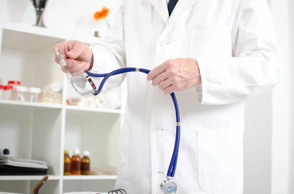 Doctor holding a stethoscope — Stock Photo, Image