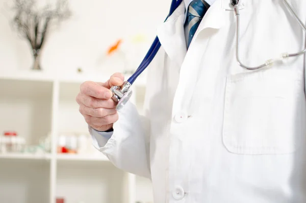 Doctor holding a stethoscope — Stock Photo, Image