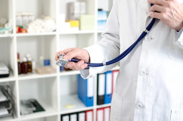 Doctor holding a stethoscope — Stock Photo, Image